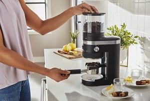 Cleaning top burr grinder